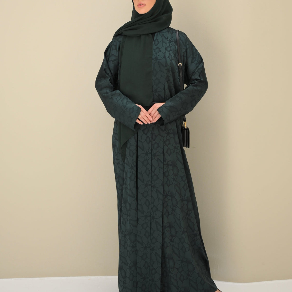 Emerald green satin abaya with elegant drape - CO-VRD modest fashion